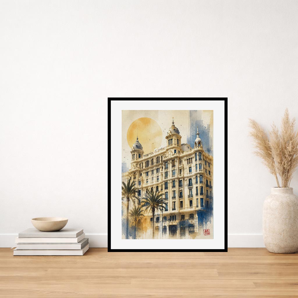 Lámina decorativa Casa Carbonell Alicante apoyada en mesa de madera, cuadro enmarcado con marco negro y passepartout blanco en decoración de hogar IMAJIN-ARTE