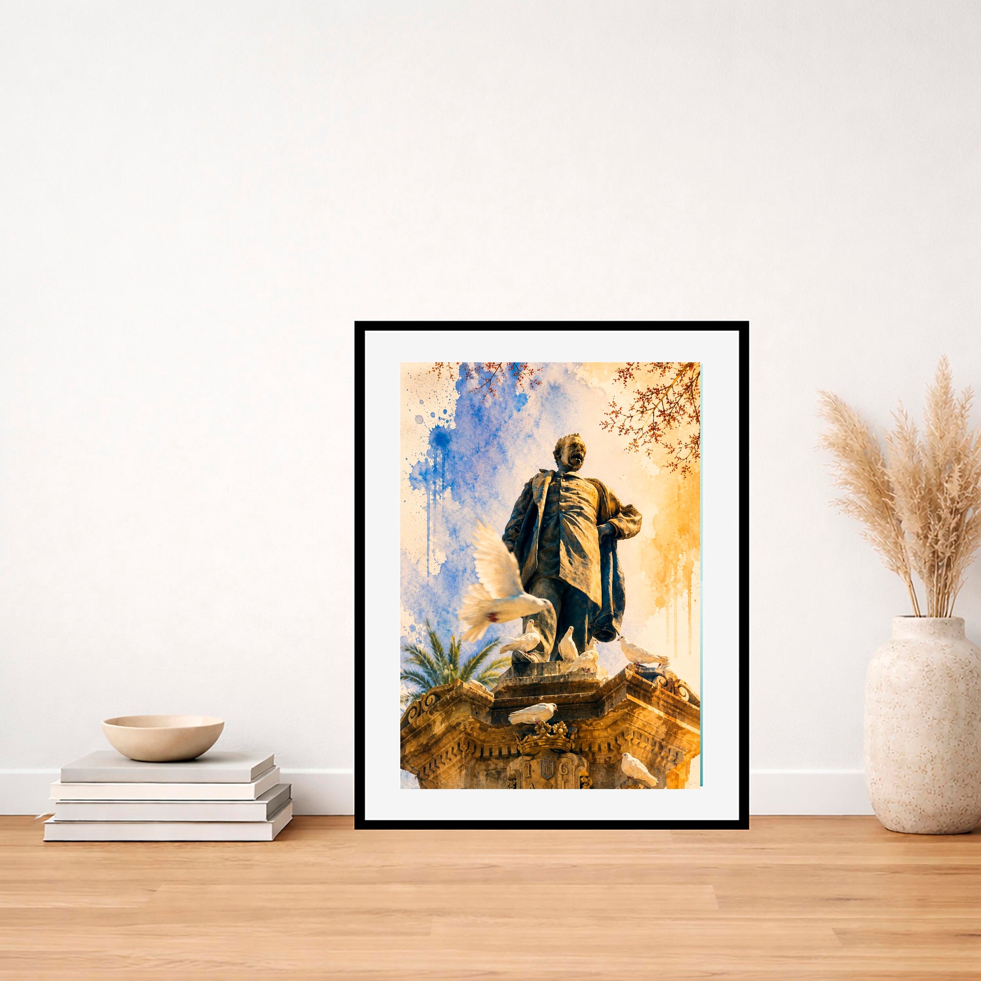 Lámina decorativa Estatua de Maisonnave enmarcada en negro apoyada en mesa de madera con jarrón de pampas y cuenco beige, decoración nórdica minimalista IMAJIN-ARTE