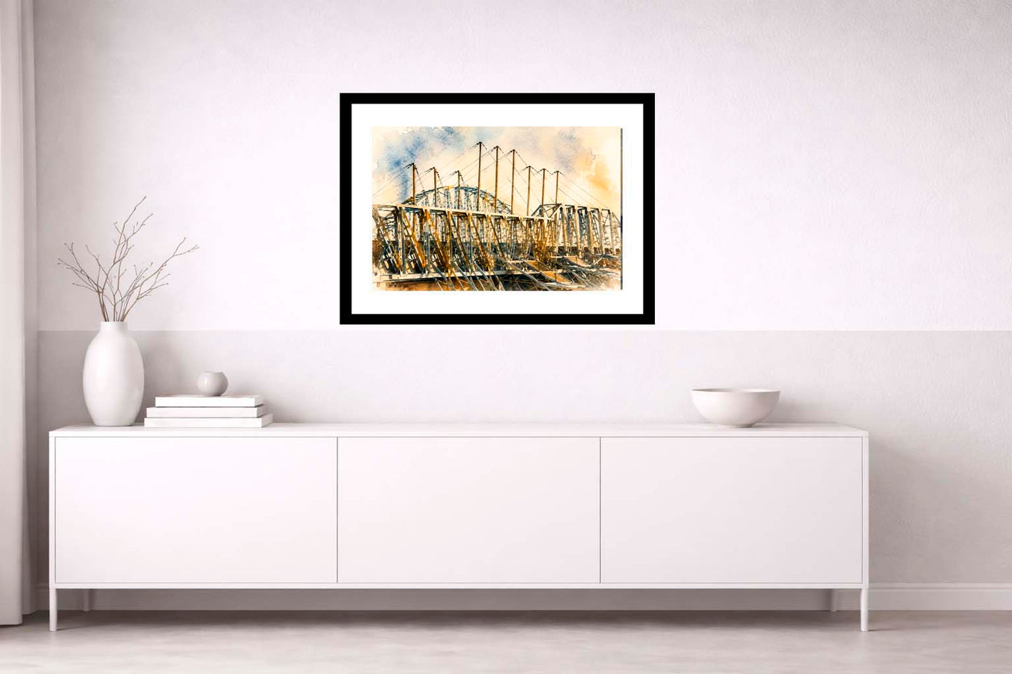 Lámina decorativa Pabellón de Tecnificación de Alicante enmarcada en negro sobre aparador blanco minimalista con jarrones blancos y cuenco, acuarela industrial en tonos ocre y azul IMAJIN-ARTE